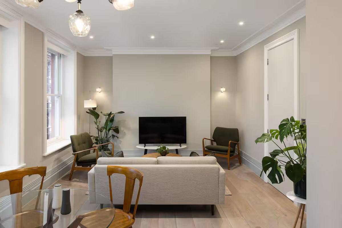a kitchen with a table and chairs